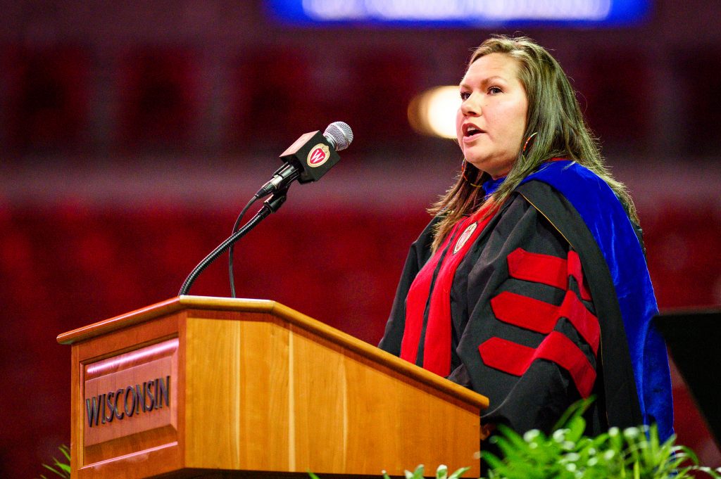 Kasey Keeler, professor in the School of Human Ecology, discusses the Native American heritage of the UW during the Chancellor's Convocation for New Students, a Wisconsin Welcome event held at the Kohl Center at the University of Wisconsin-Madison on Sept. 3, 2019.